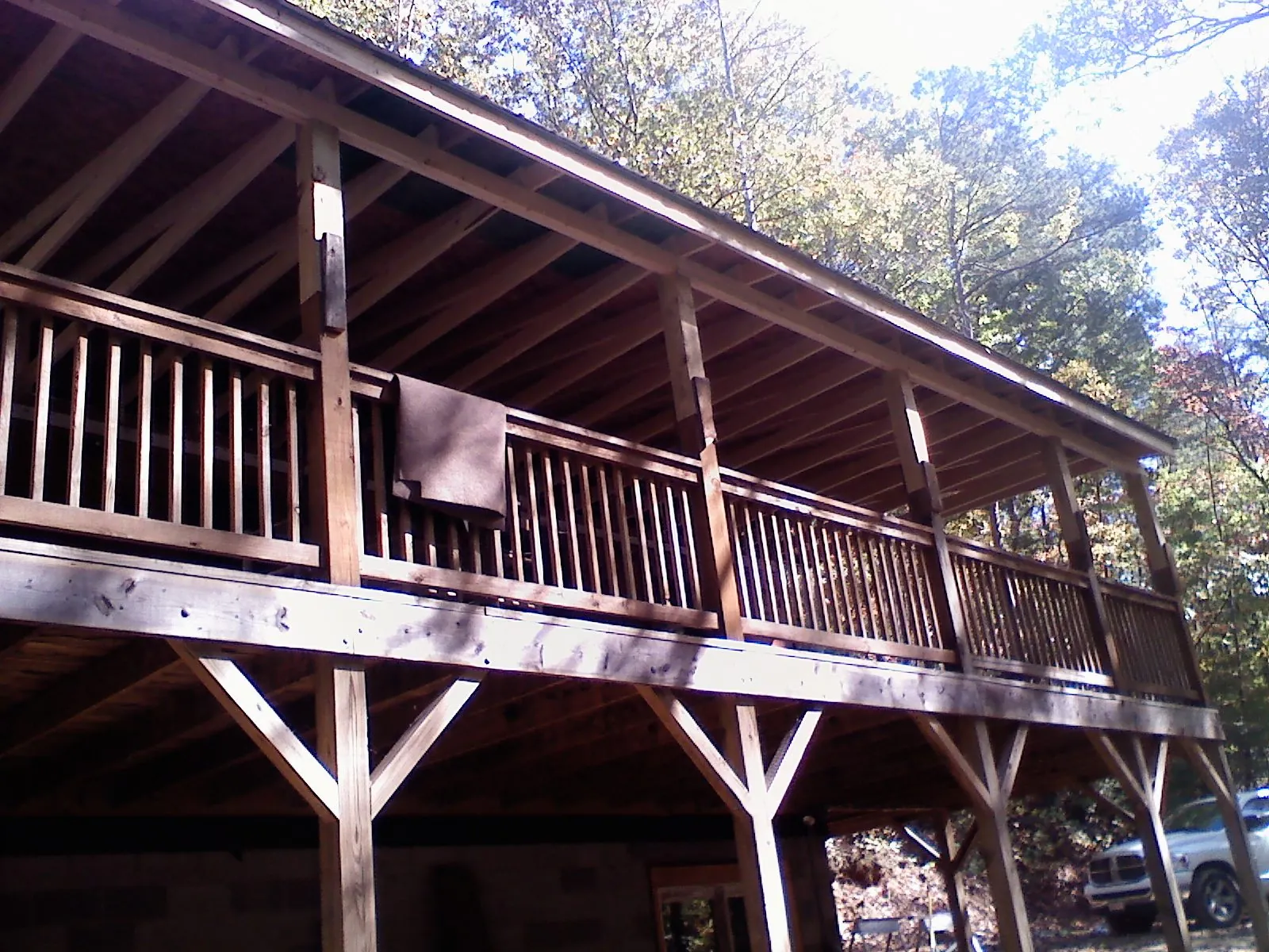 Timber framing under a new elevated porch and deck — Roof Leak Repair in Summitville by Roofing Brothers